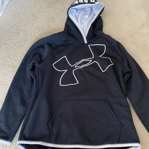 Black & white women’s under Armour sweatshirt. Size Adult XS.